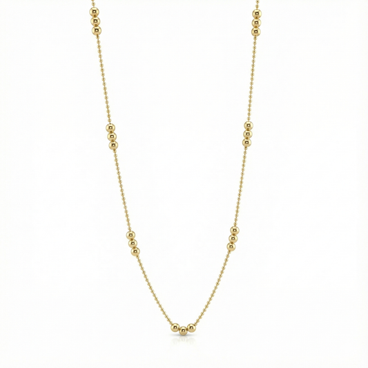 Collier fin à chaîne micro-billes dorées