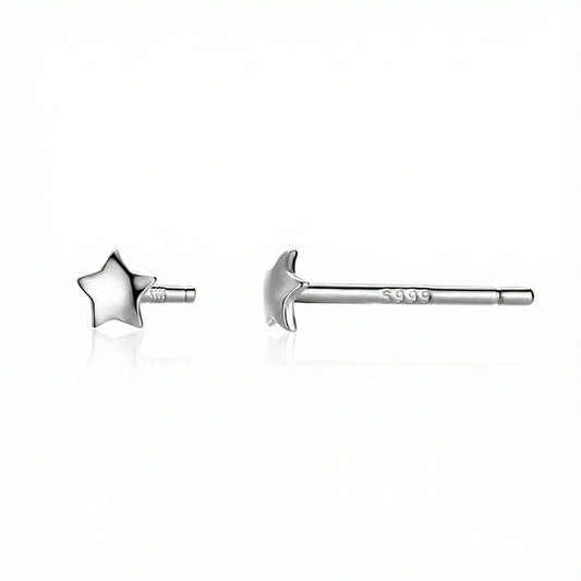 gros plan boucles d’oreilles puces argent 925 avec étoiles délicates