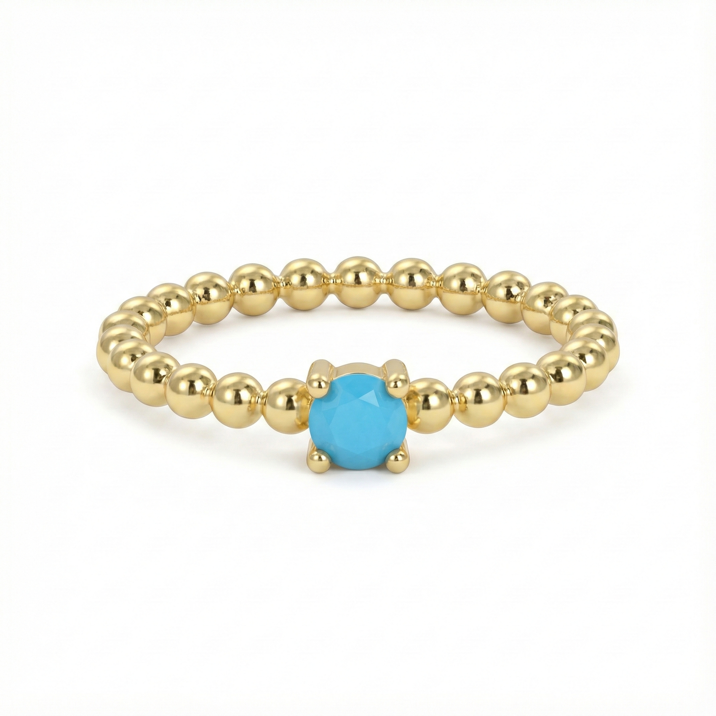 Bague dorée or 18k à anneau perlée avec pierre turquoise facettée centrale, bijou fin et lumineux