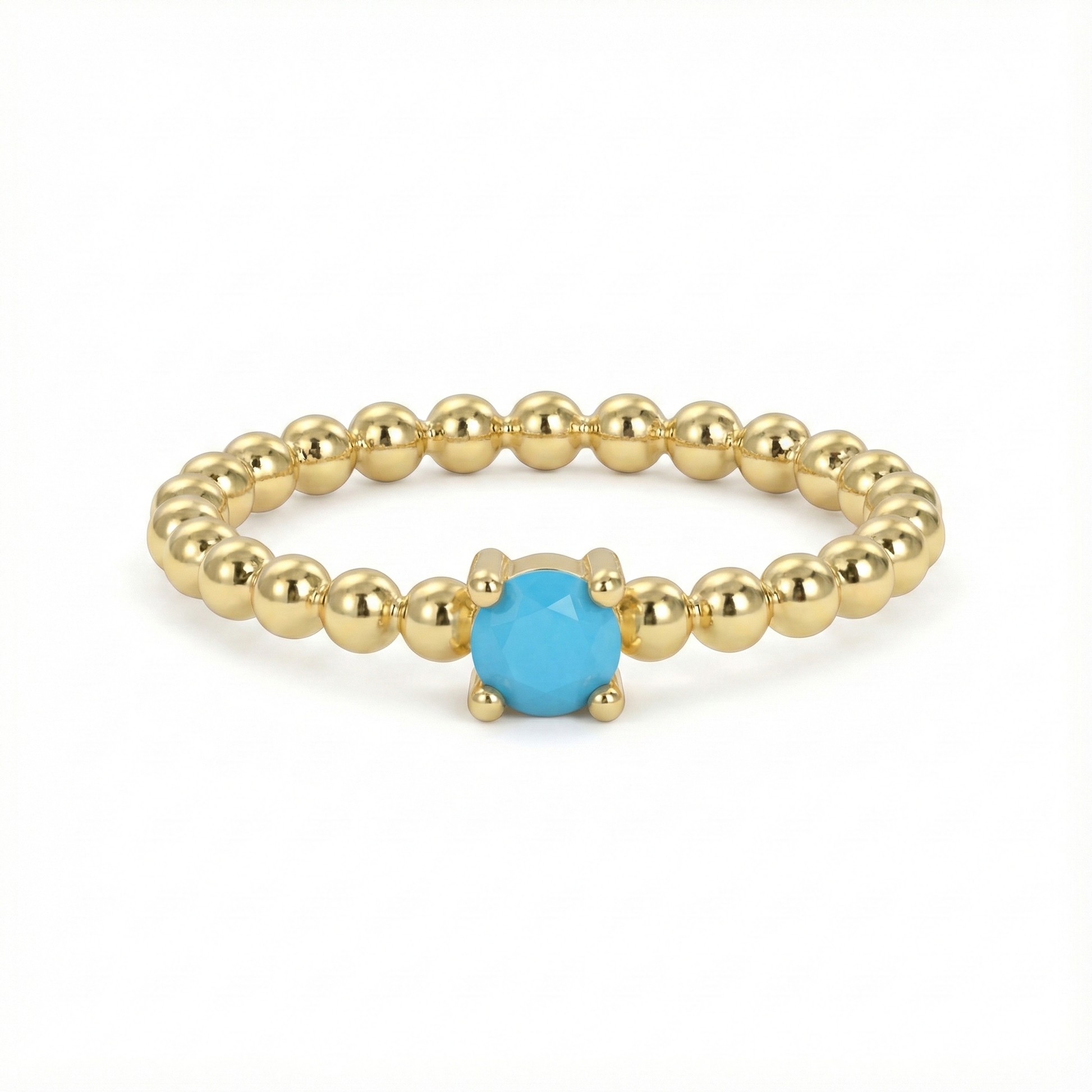 Bague dorée or 18k à anneau perlée avec pierre turquoise facettée centrale, bijou fin et lumineux