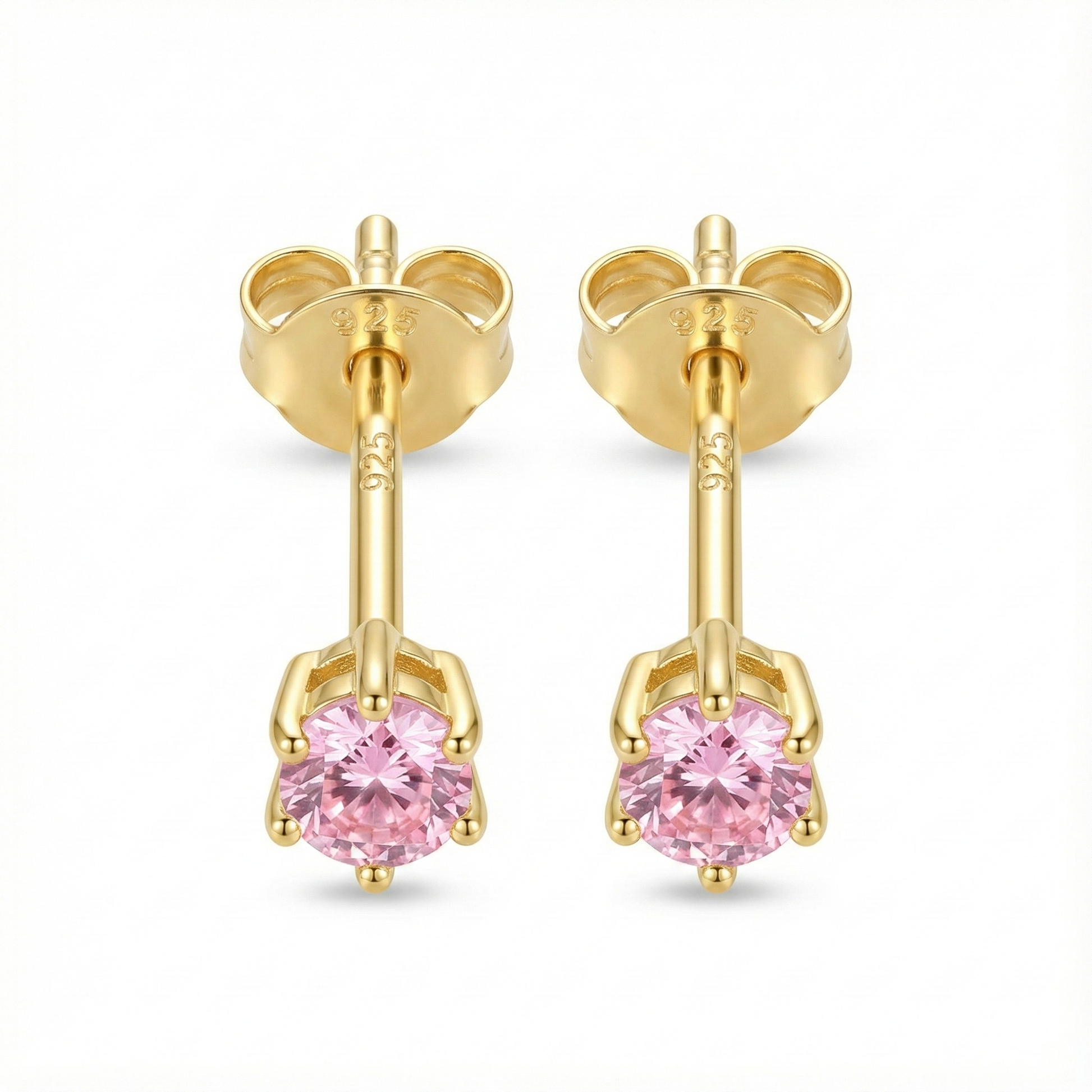 Boucles d'oreilles puces mariage ou cérémonie : zircon couleur rose pâle (rose poudré) sur monture argent doré.