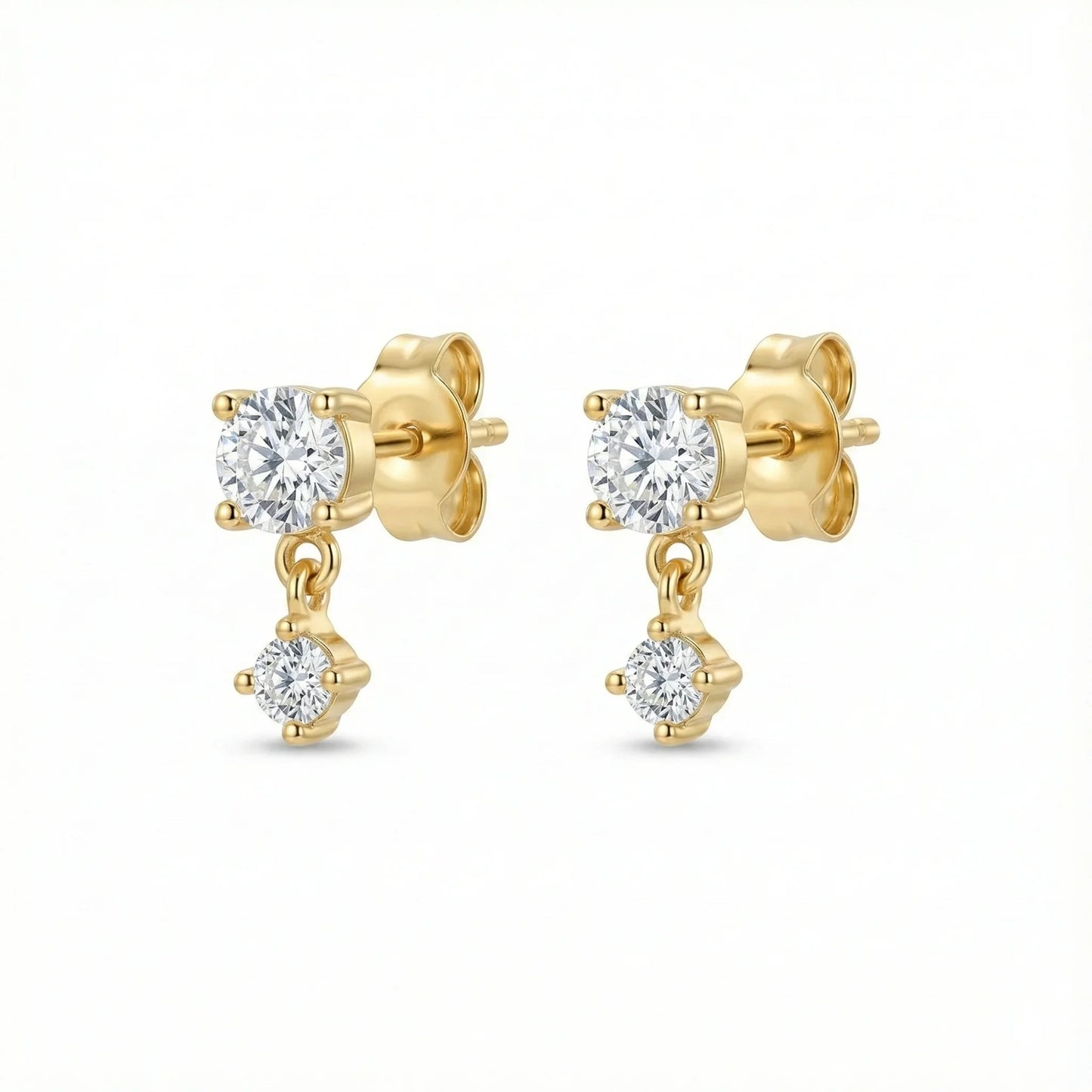 Puces d'oreilles dorées composées d'un solitaire rond et d'un second zirconium plus petit suspendu et mobile
