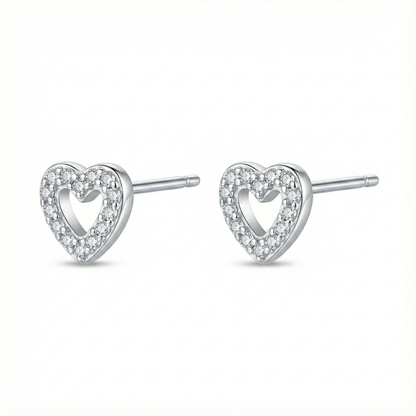 Bijou hypoallergénique pour oreilles sensibles : puces cœur en argent fin 999 (pur) serties de zircons brillants.
