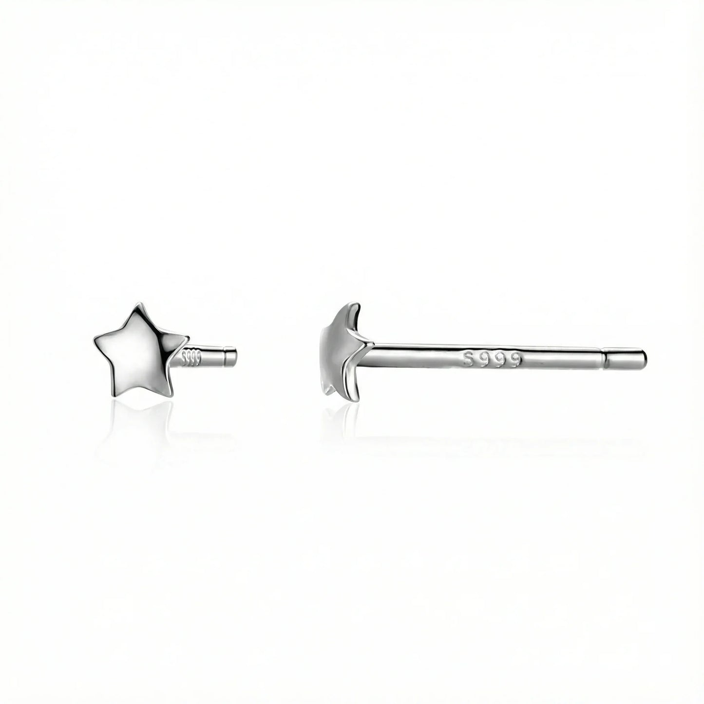 gros plan boucles d’oreilles puces argent 925 avec étoiles délicates