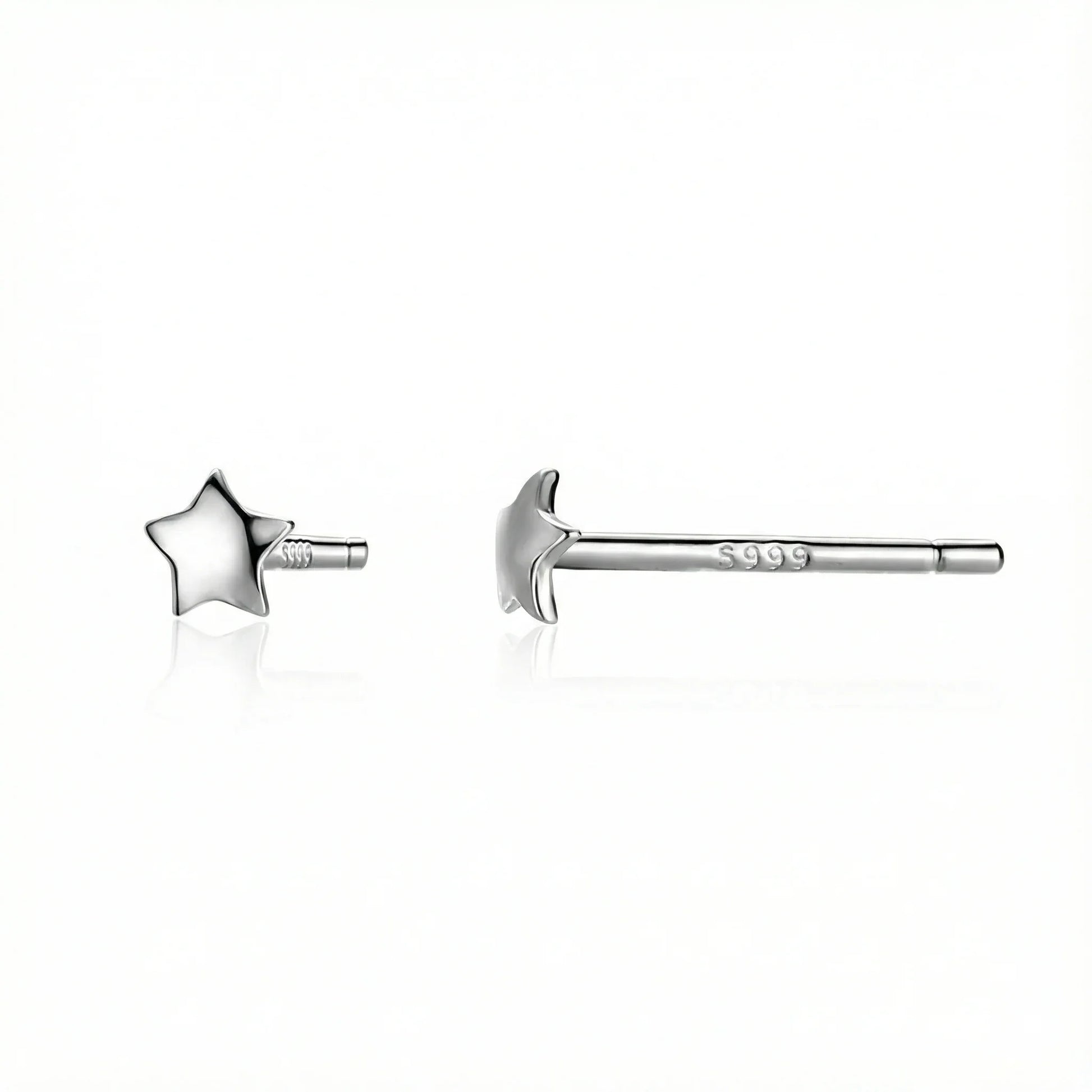 gros plan boucles d’oreilles puces argent 925 avec étoiles délicates